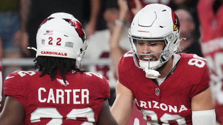 Arizona Cardinals receiver Simi Fehoko (80) celebrates his touchdown catch with teammate Michael Carter (22) as they play against the Las Vegas Raiders at State Farm Stadium in Glendale, on Aug. 23, 2025. Arizona Cardinals receiver Simi Fehoko (80) celebrates his touchdown catch with teammate Michael Carter (22) as they play against the Las Vegas Raiders at State Farm Stadium in Glendale, on Aug. 23, 2025.