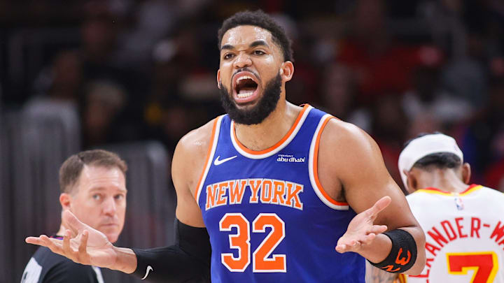 Apr 30, 2026; Atlanta, Georgia, USA; New York Knicks center Karl-Anthony Towns (32) reacts after receiving a technical foul against the Atlanta Hawks in the second quarter during game six of the first round of the 2026 NBA Playoffs at State Farm Arena. Mandatory Credit: Brett Davis-Imagn Images