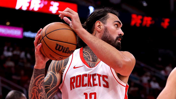 Oct 15, 2024; Houston, Texas, USA; Houston Rockets center Steven Adams (12) rebounds against the New Orleans Pelicans during the second quarter at Toyota Center. Mandatory Credit: Erik Williams-Imagn Images
