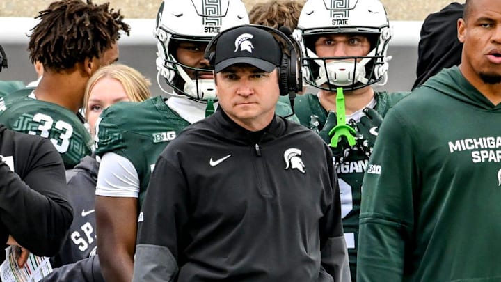Michigan State's head coach Jonathan Smith, center, looks on from the sideline during the third quarter in the game against UCLA on Saturday, Oct. 11, 2025, at Spartan Stadium in East Lansing. Michigan State's head coach Jonathan Smith, center, looks on from the sideline during the third quarter in the game against UCLA on Saturday, Oct. 11, 2025, at Spartan Stadium in East Lansing.