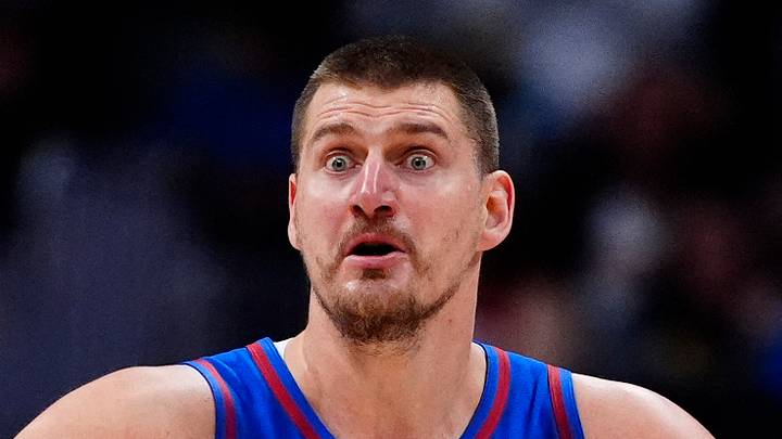 Feb 9, 2026; Denver, Colorado, USA; Denver Nuggets center Nikola Jokic (15) reacts in the second quarter against the Cleveland Cavaliers at Ball Arena. Mandatory Credit: Ron Chenoy-Imagn Images