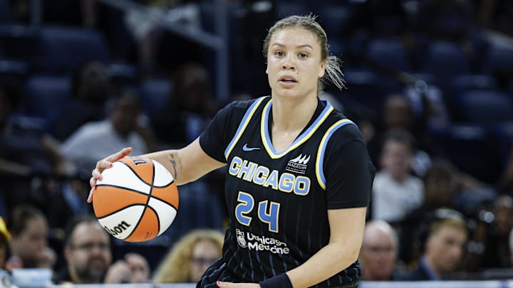Jul 12, 2025; Chicago, Illinois, USA; Chicago Sky guard Rachel Banham (24) brings the ball up court against the Minnesota Lynx during the second half of a WNBA game at Wintrust Arena. Mandatory Credit: Kamil Krzaczynski-Imagn Images