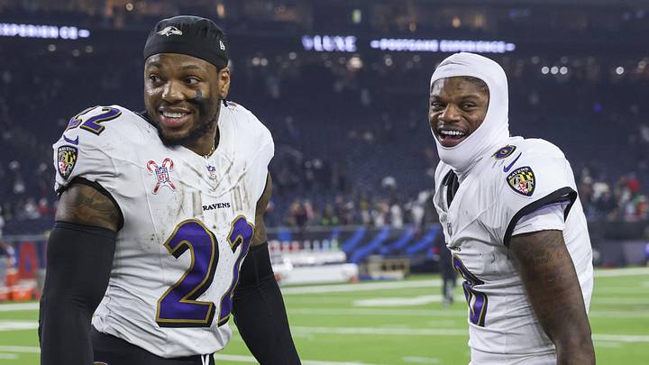 Baltimore Ravens running back Derrick Henry (22) and quarterback Lamar Jackson (8)
