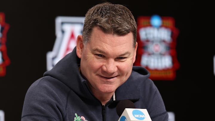 Apr 3, 2026; Indianapolis, IN, USA; Arizona Wildcats head coach Tommy Lloyd speaks during a press conference ahead of the Final Four of the men's 2026 NCAA Tournament at Lucas Oil Stadium. Mandatory Credit: Trevor Ruszkowski-Imagn Images Apr 3, 2026; Indianapolis, IN, USA; Arizona Wildcats head coach Tommy Lloyd speaks during a press conference ahead of the Final Four of the men's 2026 NCAA Tournament at Lucas Oil Stadium. Mandatory Credit: Trevor Ruszkowski-Imagn Images