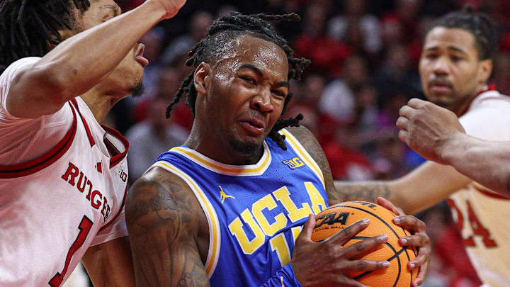 Jan 13, 2025; Piscataway, New Jersey, USA; UCLA Bruins guard Sebastian Mack (12) goes to the basket as Rutgers Scarlet Knights guard Jamichael Davis (1) defends during the first half at Jersey Mike's Arena. Mandatory Credit: Vincent Carchietta-Imagn Images Jan 13, 2025; Piscataway, New Jersey, USA; UCLA Bruins guard Sebastian Mack (12) goes to the basket as Rutgers Scarlet Knights guard Jamichael Davis (1) defends during the first half at Jersey Mike's Arena. Mandatory Credit: Vincent Carchietta-Imagn Images