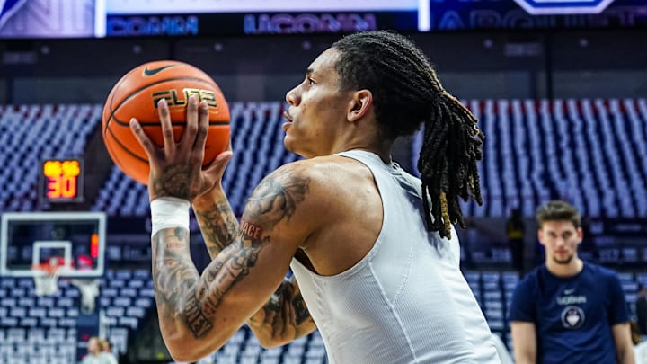 Mar 5, 2025; Storrs, Connecticut, USA; UConn Huskies guard Solo Ball (1) warms up before the start of the game against the Marquette Golden Eagles at Harry A. Gampel Pavilion. Mandatory Credit: David Butler II-Imagn Images