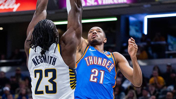 Oct 23, 2025; Indianapolis, Indiana, USA; Oklahoma City Thunder guard Aaron Wiggins (21) shoots the ball while Indiana Pacers guard Aaron Nesmith (23) defends in the second half at Gainbridge Fieldhouse. Mandatory Credit: Trevor Ruszkowski-Imagn Images Oct 23, 2025; Indianapolis, Indiana, USA; Oklahoma City Thunder guard Aaron Wiggins (21) shoots the ball while Indiana Pacers guard Aaron Nesmith (23) defends in the second half at Gainbridge Fieldhouse. Mandatory Credit: Trevor Ruszkowski-Imagn Images