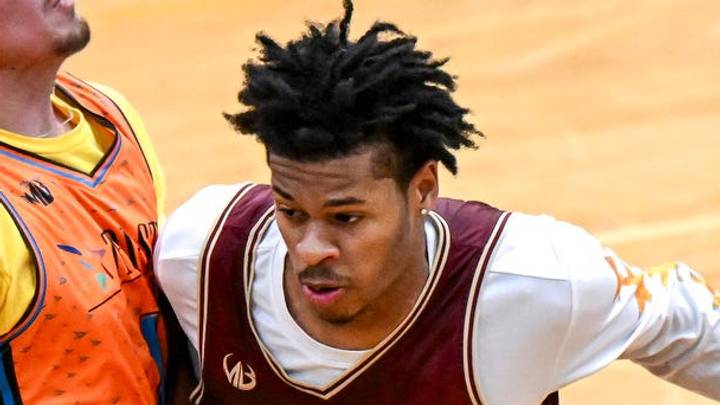 Team Faygo’s and Michigan State's Jasiah Jervis, right, moves the ball against Team Tri-Star’s Devan Wilson during the Moneyball Pro-Am on Thursday, June 25, 2026, at Holt High School. Team Faygo’s and Michigan State's Jasiah Jervis, right, moves the ball against Team Tri-Star’s Devan Wilson during the Moneyball Pro-Am on Thursday, June 25, 2026, at Holt High School.
