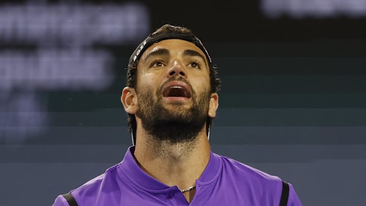 Matteo Berrettini reacts after missing a shot