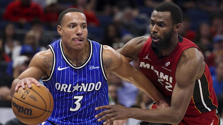 Dec 5, 2025; Orlando, Florida, USA; Orlando Magic guard Desmond Bane (3) drives to the basket past Miami Heat forward Andrew Wiggins (22) in the fourth quarter at Kia Center. Mandatory Credit: Nathan Ray Seebeck-Imagn Images Dec 5, 2025; Orlando, Florida, USA; Orlando Magic guard Desmond Bane (3) drives to the basket past Miami Heat forward Andrew Wiggins (22) in the fourth quarter at Kia Center. Mandatory Credit: Nathan Ray Seebeck-Imagn Images