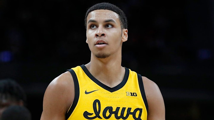 Iowa Hawkeyes forward Keegan Murray (15) rests during the first half of the Big Ten championship title game Sunday, March 13, 2022, at Gainbridge Fieldhouse in Indianapolis. Iowa won, 75-66.