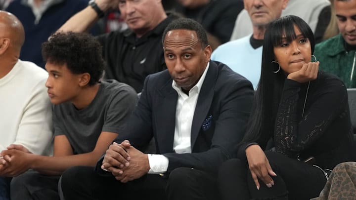 Smith admitted he was playing on his phone but said it was during a timeout