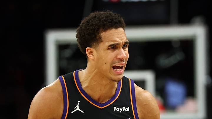 Phoenix, Arizona, USA; Phoenix Suns forward Oso Ighodaro (11) argues with NBA referee Tony Brothers against the Oklahoma City Thunder during game four of the first round of the 2026 NBA Playoffs at Mortgage Matchup Center on Apr 27, 2026.