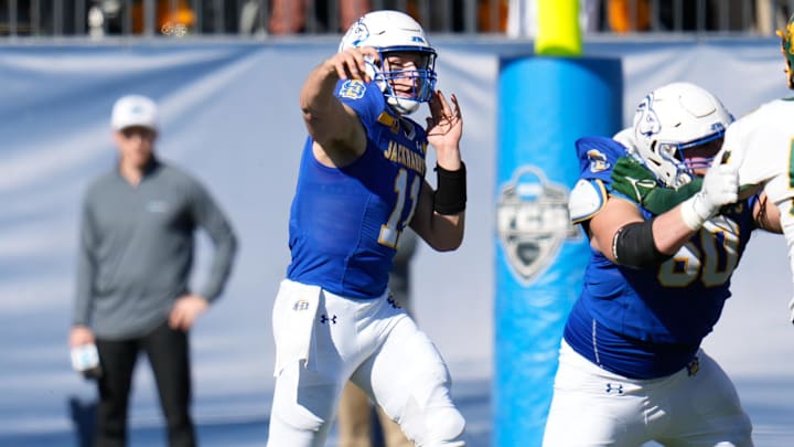 Jan 8, 2023; Frisco, Texas, US;  South Dakota State Jackrabbits quarterback Mark Gronowski (11) passes the ball against the North Dakota State Bison during the first half of the DI Football Championship at Toyota Stadium. Mandatory Credit: Chris Jones-Imagn Images