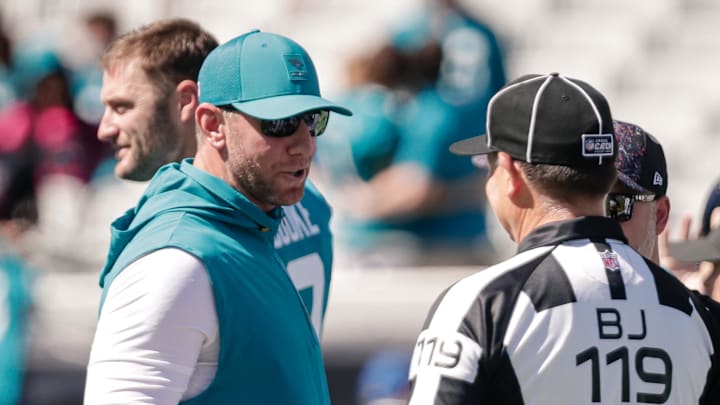 Oct 12, 2025; Jacksonville, Florida, USA;Jacksonville Jaguars head coach Liam Coen talks with a referee before the game against the Seattle Seahawks at EverBank Stadium. Mandatory Credit: Travis Register-Imagn Images