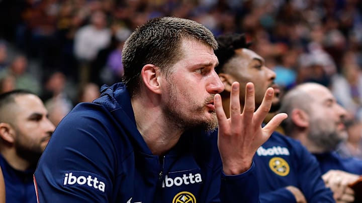 Mar 5, 2026; Denver, Colorado, USA; Denver Nuggets center Nikola Jokic (15) reacts from the bench in the fourth quarter against the Los Angeles Lakers at Ball Arena. Mandatory Credit: Isaiah J. Downing-Imagn Images