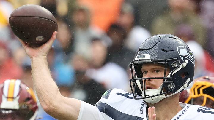 Seattle Seahawks quarterback Sam Darnold drops back to pass against the Washington Commanders.