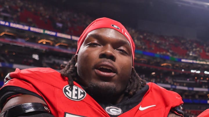 Georgia Bulldogs defensive lineman Christen Miller celebrates after a victory