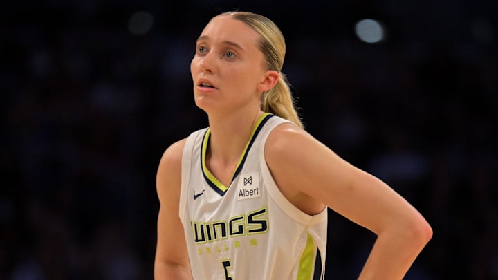 Sep 7, 2025; Los Angeles, California, USA;  Dallas Wings guard Paige Bueckers (5) looks on during the first half against the Los Angeles Sparks at Crypto.com Arena. Mandatory Credit: Jayne Kamin-Oncea-Imagn Images