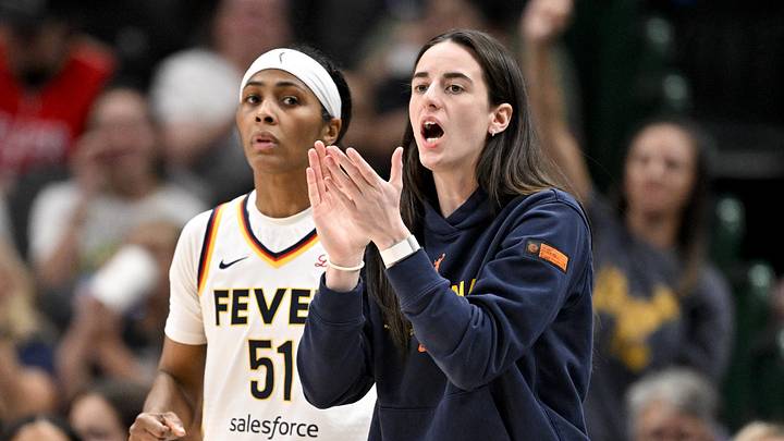 Indiana Fever guard Sydney Colson (51) and guard Caitlin Clark (22)