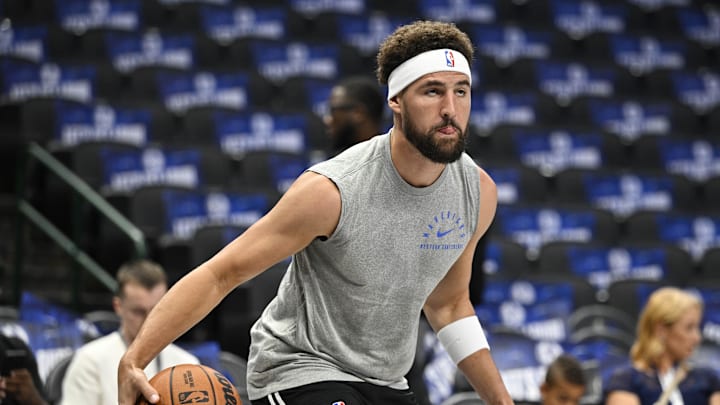 Oct 7, 2024; Dallas, Texas, USA; Dallas Mavericks guard Klay Thompson (31) warms up before the game between the Dallas Mavericks and the Memphis Grizzlies at the American Airlines Center. Mandatory Credit: Jerome Miron-Imagn Images