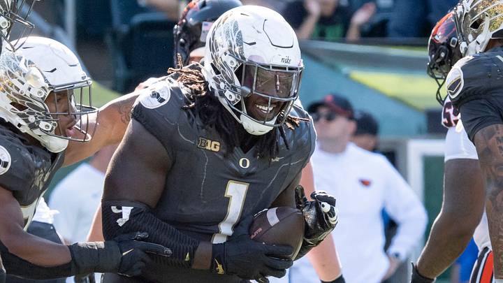 Oregon Ducks defensive lineman Bear Alexander celebrates fumble recovery as the Oregon Ducks host the Oregon State Beavers. Oregon Ducks defensive lineman Bear Alexander celebrates fumble recovery as the Oregon Ducks host the Oregon State Beavers.