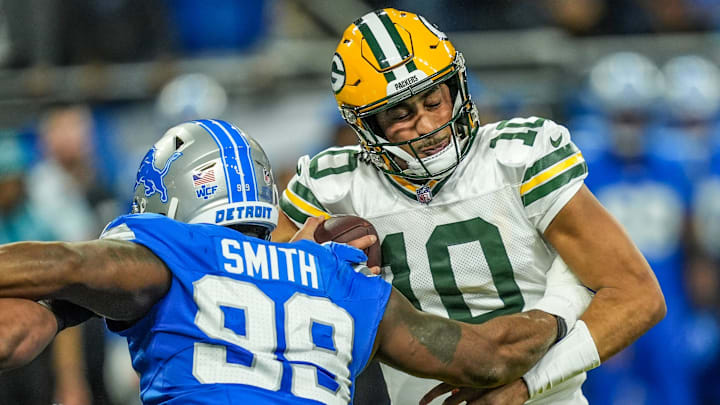 Green Bay Packers quarterback Jordan Love (10) is sacked by Detroit Lions defensive end Za'Darius Smith last season.