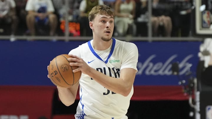 Jul 10, 2025; Las Vegas, NV, USA; Dallas Mavericks forward Cooper Flagg (32) looks to pass the ball against the Los Angeles Lakers in the first quarter of their game at Thomas & Mack Center. Mandatory Credit: Candice Ward-Imagn Images