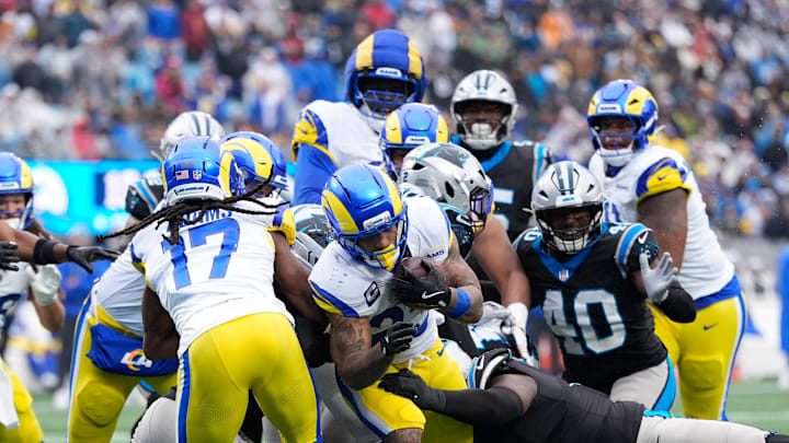 Nov 30, 2025; Charlotte, North Carolina, USA; Los Angeles Rams running back Kyren Williams (23) rushes during the fourth quarter against the Carolina Panthers at Bank of America Stadium. Mandatory Credit: Jim Dedmon-Imagn Images