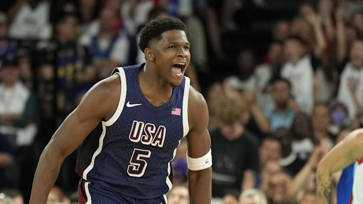 Aug 10, 2024; Paris, France; United States guard Anthony Edwards (5) reacts against France in the second half in the men's basketball gold medal game during the Paris 2024 Olympic Summer Games at Accor Arena. Mandatory Credit: Kyle Terada-Imagn Images