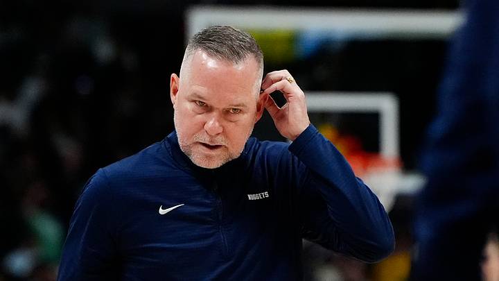 Mar 15, 2025; Denver, Colorado, USA; Denver Nuggets head coach Michael Malone following a timeout in the fourth quarter against the Washington Wizards at Ball Arena. Mandatory Credit: Ron Chenoy-Imagn Images Mar 15, 2025; Denver, Colorado, USA; Denver Nuggets head coach Michael Malone following a timeout in the fourth quarter against the Washington Wizards at Ball Arena. Mandatory Credit: Ron Chenoy-Imagn Images