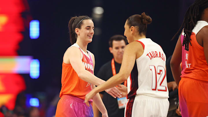 Clark and Taurasi shake hands at the WNBA All-Star Game.