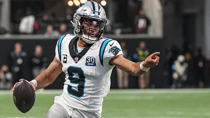 Carolina Panthers quarterback Bryce Young (9) runs for a touchdown against the Atlanta Falcons during the second half at Mercedes-Benz Stadium.