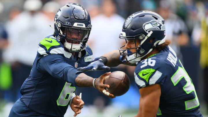 Aug 15, 2026; Seattle, Washington, USA; Seattle Seahawks quarterback Jalen Milroe (6) hands the ball to Seattle running back George Holani (36) during the game against the Dallas Cowboys at Lumen Field. Mandatory Credit: Steven Bisig-Imagn Images Aug 15, 2026; Seattle, Washington, USA; Seattle Seahawks quarterback Jalen Milroe (6) hands the ball to Seattle running back George Holani (36) during the game against the Dallas Cowboys at Lumen Field. Mandatory Credit: Steven Bisig-Imagn Images
