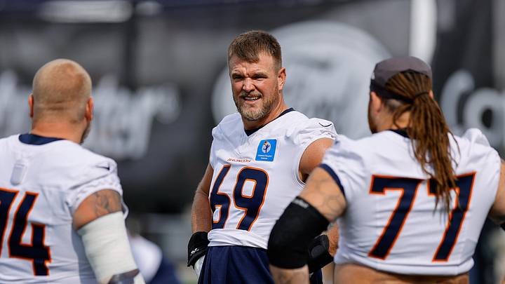 Denver Broncos offensive tackle Mike McGlinchey (69) and guard Ben Powers (74) and guard Quinn Meinerz (77) 