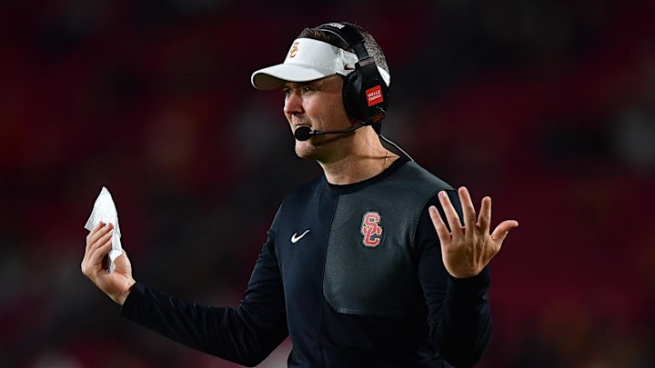 Sep 20, 2025; Los Angeles, California, USA; Southern California Trojans head coach Lincoln Riley watches game action against the Michigan State Spartans during the second half at the Los Angeles Memorial Coliseum. Mandatory Credit: Gary A. Vasquez-Imagn Images