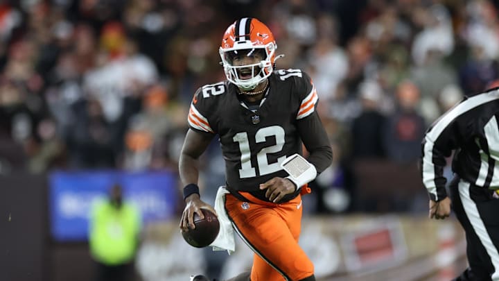 Nov 16, 2025; Cleveland, Ohio, USA; Cleveland Browns quarterback Shedeur Sanders (12) runs for a gain during the fourth quarter against the Baltimore Ravens at Huntington Bank Field. Mandatory Credit: Scott Galvin-Imagn Images