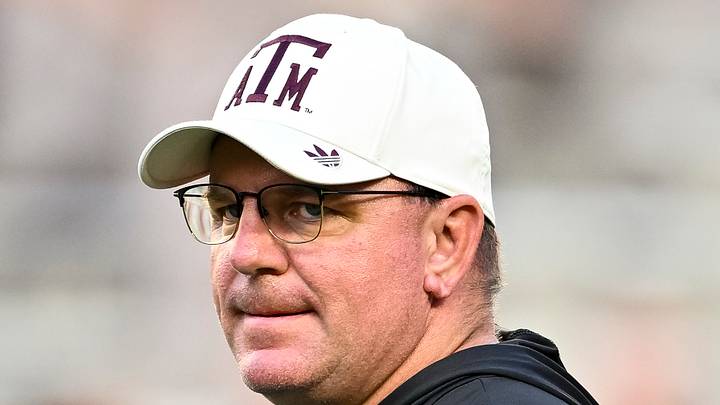 Texas A&M Aggies head coach Mike Elko looks on prior to the game against the Florida Gators at Kyle Field. Texas A&M Aggies head coach Mike Elko looks on prior to the game against the Florida Gators at Kyle Field.