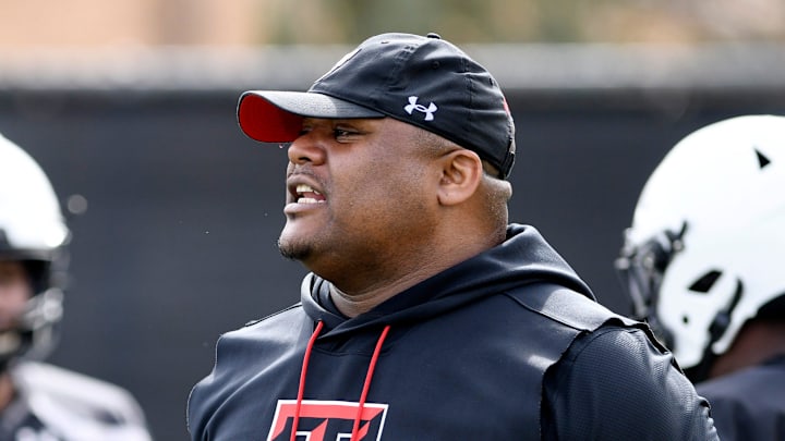 Texas Tech's defensive line coach Zarnell Fitch instructs football players during practice, Tuesday, March 21, 2023, at Sports Performance Center.