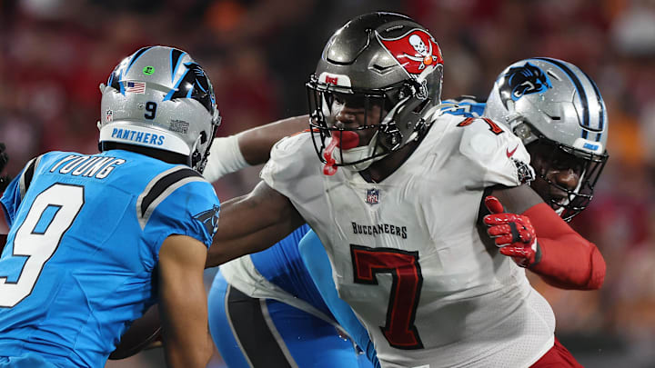 Dec 3, 2023; Tampa, Florida, USA; Tampa Bay Buccaneers linebacker Shaquil Barrett (7) rushes Carolina Panthers quarterback Bryce Young (9) during the second half at Raymond James Stadium. Mandatory Credit: Kim Klement Neitzel-Imagn Images
