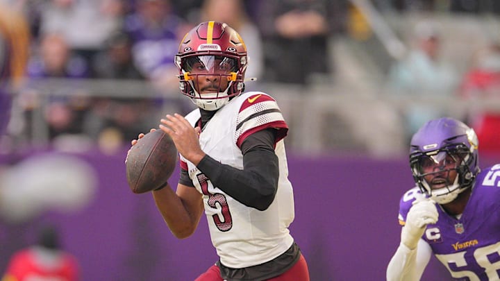 Dec 7, 2025; Minneapolis, Minnesota, USA; Washington Commanders quarterback Jayden Daniels (5) drops back to pass during the second half at U.S. Bank Stadium. Mandatory Credit: Brad Rempel-Imagn Images