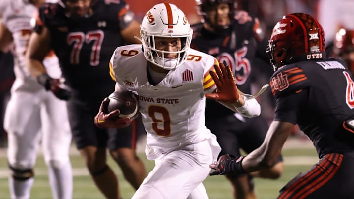Nov 23, 2024; Salt Lake City, Utah, USA; Iowa State Cyclones wide receiver Jayden Higgins (9) runs after a catch against Utah Utes cornerback Cameron Calhoun (4) during the third quarter at Rice-Eccles Stadium. Mandatory Credit: Rob Gray-Imagn Images