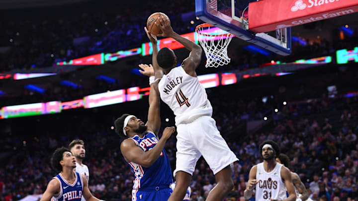 Nov 13, 2024; Philadelphia, Pennsylvania, USA; Cleveland Cavaliers center Evan Mobley (4) shoots against Philadelphia 76ers forward Guerschon Yabusele (28) in the fourth quarter at Wells Fargo Center. Mandatory Credit: Kyle Ross-Imagn Images