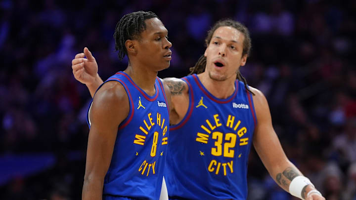 Jan 31, 2025; Philadelphia, Pennsylvania, USA; Denver Nuggets guard Peyton Watson (8) reacts with forward Aaron Gordon (32) against the Philadelphia 76ers in the second quarter at Wells Fargo Center.