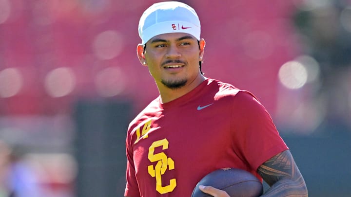 Oct 11, 2025; Los Angeles, California, USA;  USC Trojans quarterback Jayden Maiava (14) warms up prior to the game against the Michigan Wolverines at United Airlines Field at the Los Angeles Memorial Coliseum. Mandatory Credit: Jayne Kamin-Oncea-Imagn Images