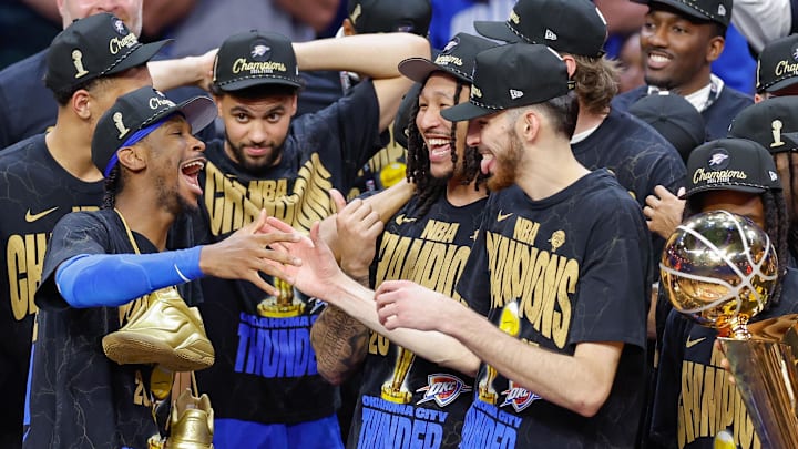 Jun 22, 2025; Oklahoma City, Oklahoma, USA; Oklahoma City Thunder guard Shai Gilgeous-Alexander (2) and Oklahoma City Thunder forward Chet Holmgren (7) celebrate after their team defeated the Indiana Pacers in game seven of the 2025 NBA Finals at Paycom Center. Mandatory Credit: Alonzo Adams-Imagn Images