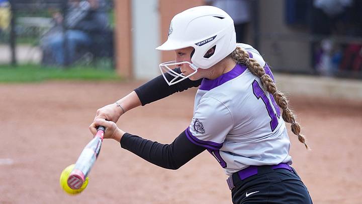 Brownsburg Izzy Neal (10) hits the ball on Saturday, April 22, 2023 at Cherry Tree Softball Complex in Carmel.