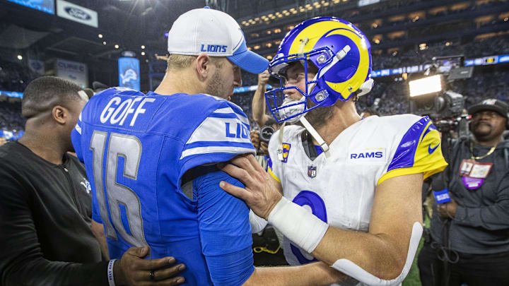 Detroit Lions quarterback Jared Goff (16) and Los Angeles Rams quarterback Matthew Stafford (9) greet each other 