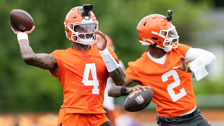 Cleveland Browns quarterbacks Deshaun Watson (4) and Shedeur Sanders (2) throw the ball during mandatory mini camp.