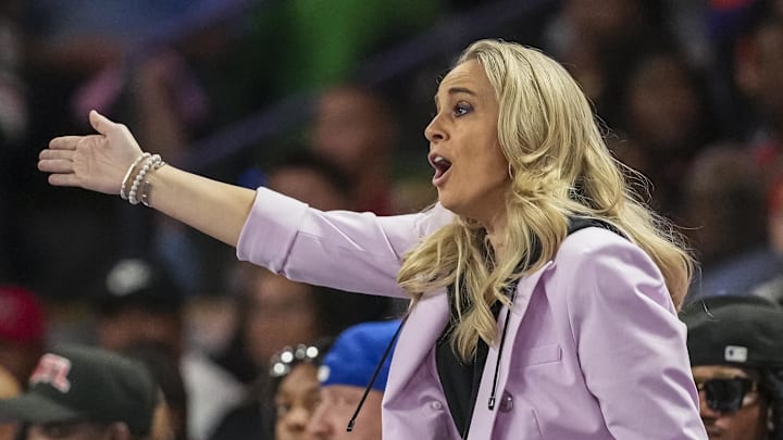 The WNBA fined Aces coach Becky Hammon for her comments on officiating.